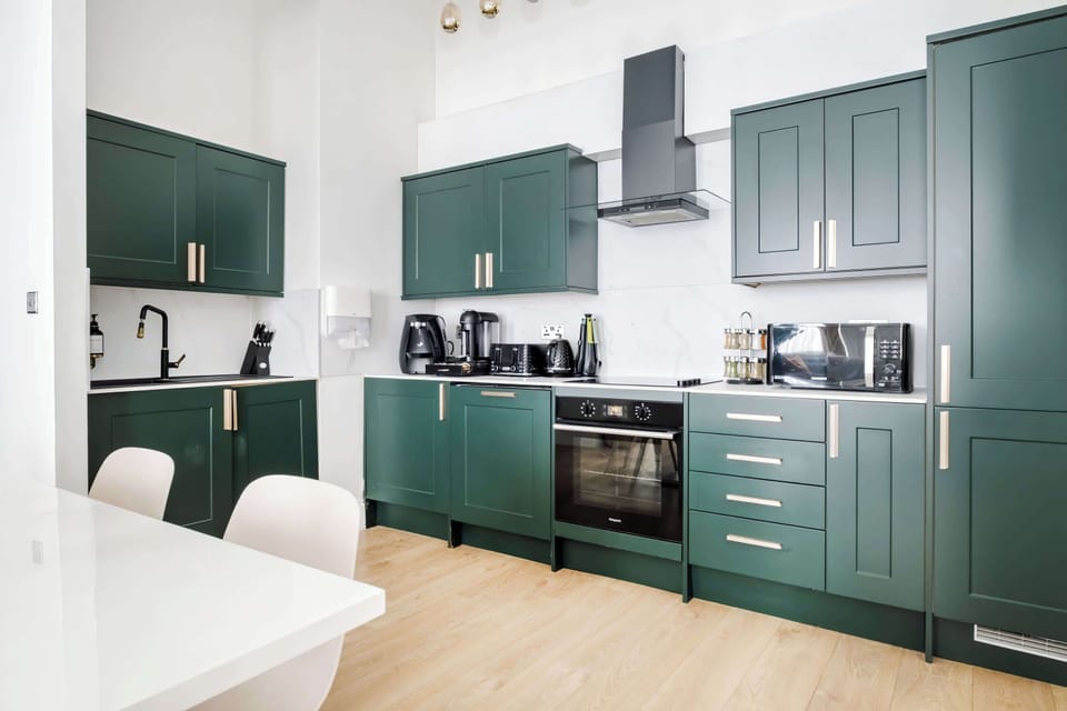 Full Kitchen | Fully equipped with everything you could possibly need, including a fresh filtered water dispenser, washing machine and dryer, a Nespresso machine with pods, plus all the cooking utensils and essentials for preparing meals.
