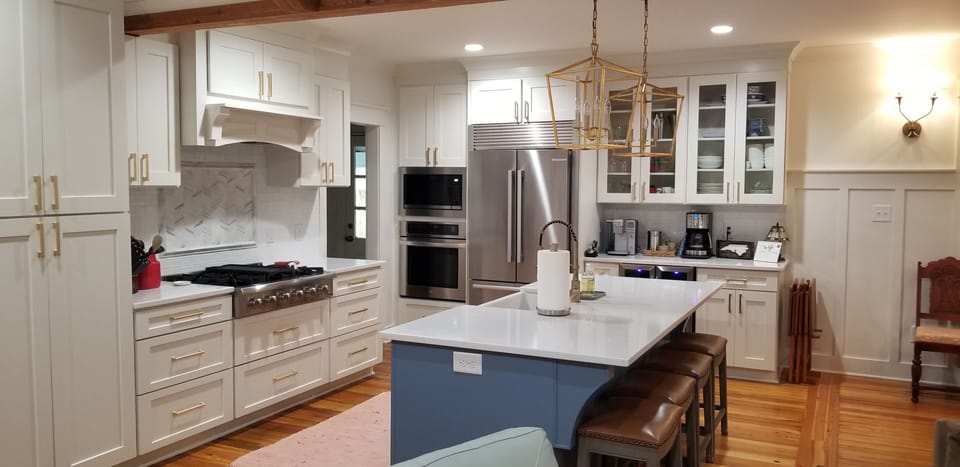 Fully stocked kitchen that opens up to the dining and living room.