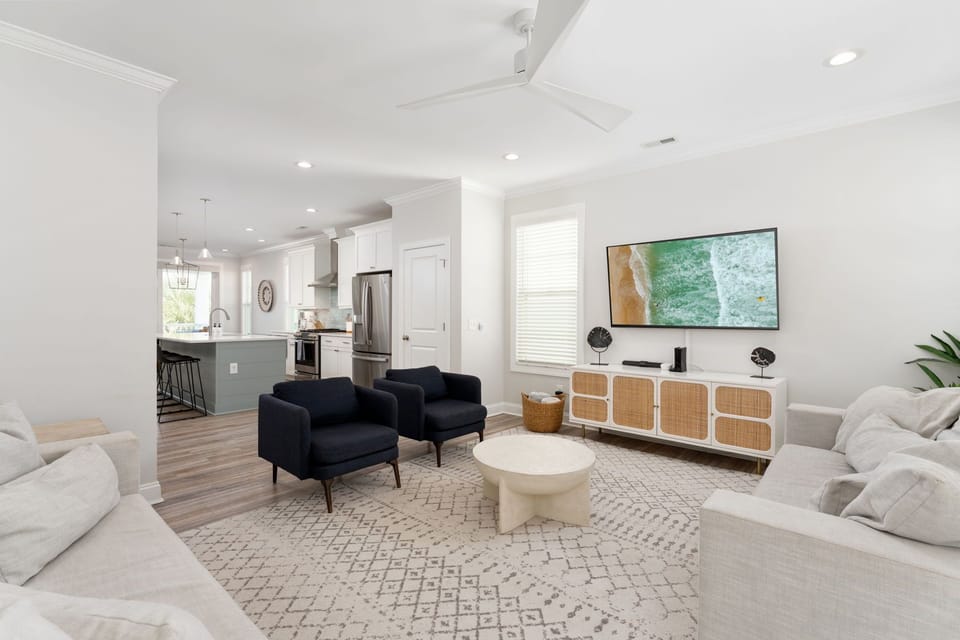 [Living Room] 3rd Floor - Spacious & Open, features smart TV,  Flows into Kitchen and Dinning