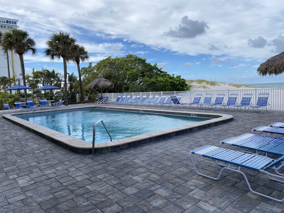 Year-round, heated pool located right on the beach with plenty of sun loungers.