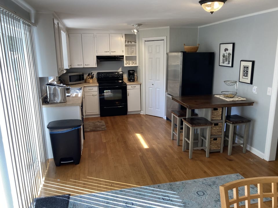 Huge upstairs kitchen, with patio door opening onto deck.  
