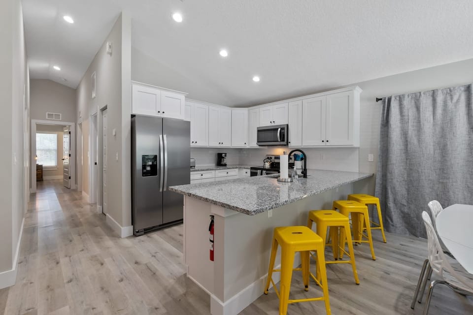 The gourmet kitchen comes fully equipped with everything you could need