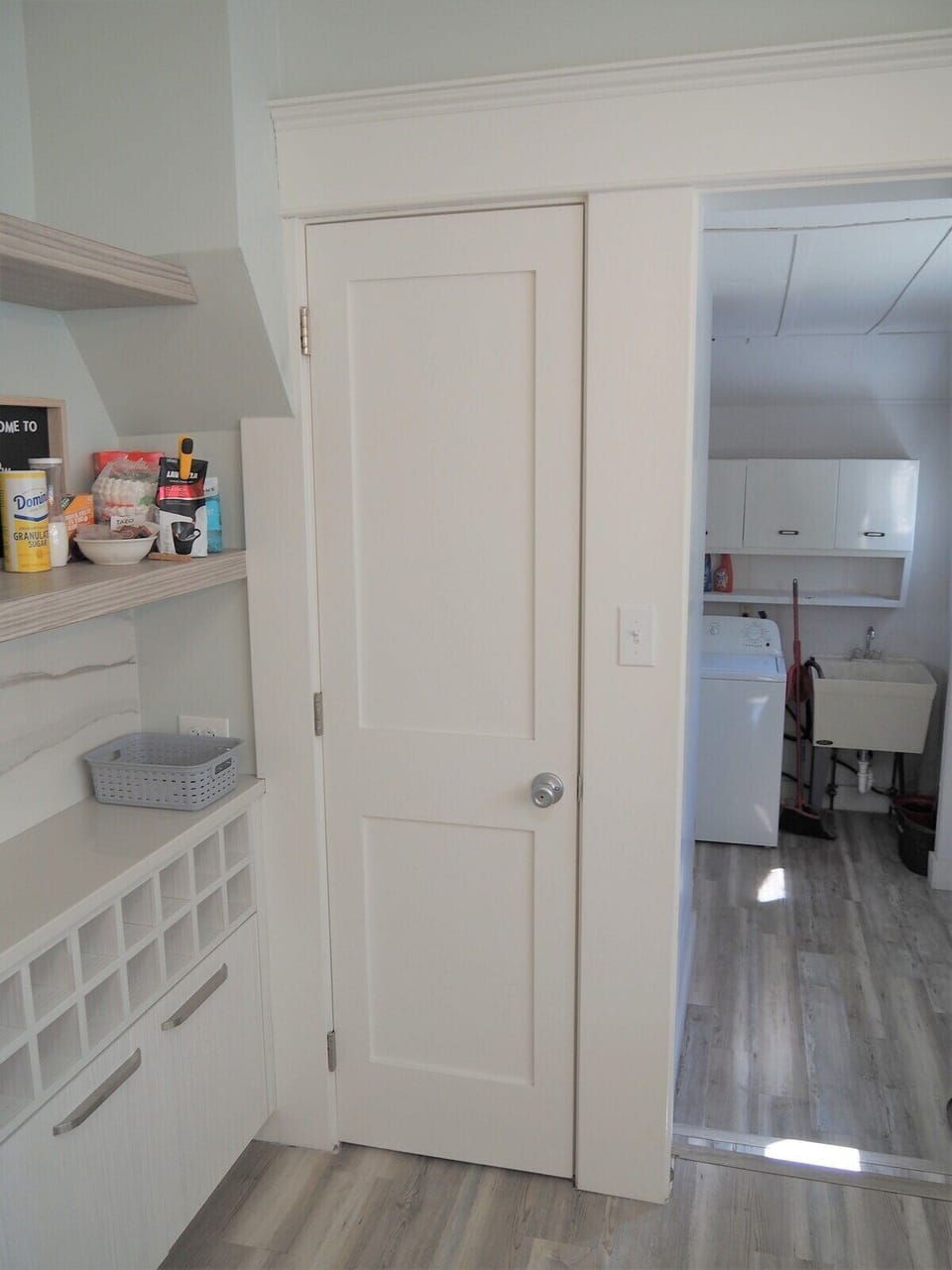 BATHROOM #1 (MAIN FLOOR):  Full bathroom with entry from the kitchen.