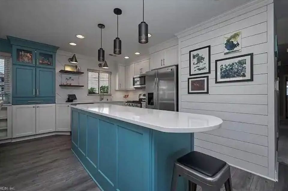 More pictures of the ship lap and stunning, luxury kitchen. Modern Coastal Chic!