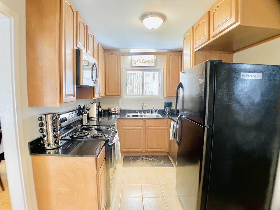 Stove, refrigerator, microwave. toaster, dish washer & coffee maker