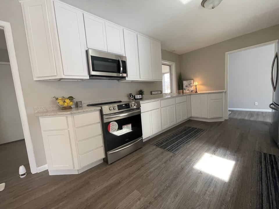 Stove w/ air fryer setting.  Kuerig coffee maker & items for full meal prep