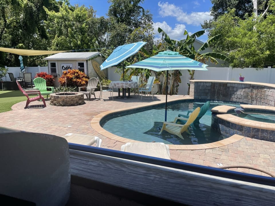 Mini Resort style Backyard complete w/ fire pit