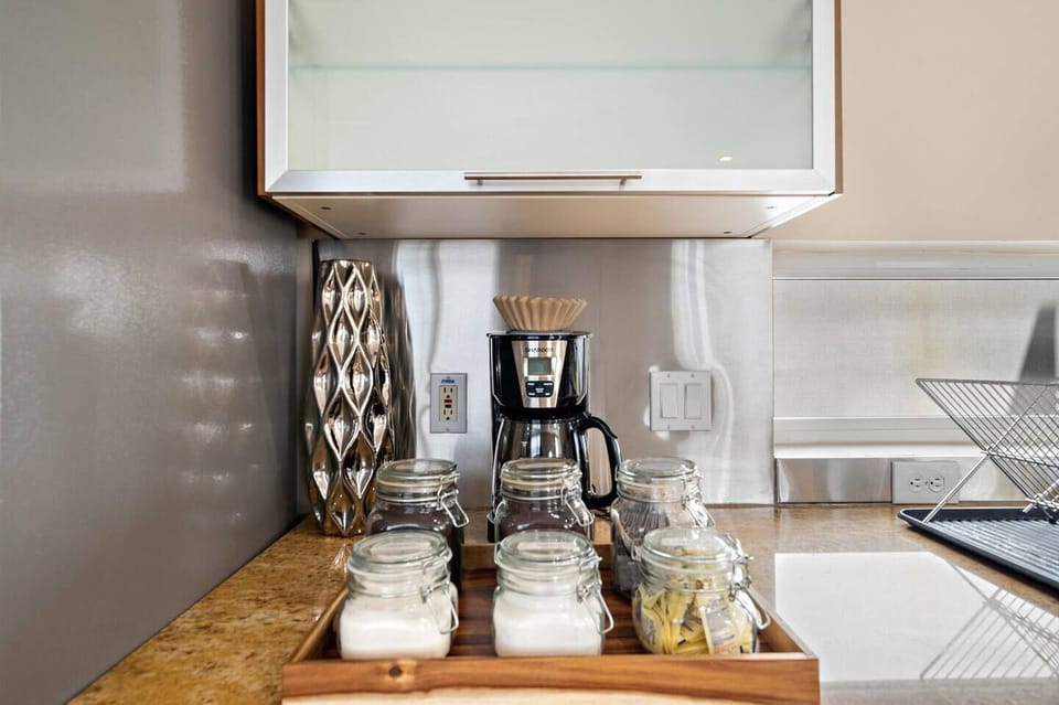 Coffee bar includes regular coffee, decaf, tea, sugar, cream, and sweetener.
