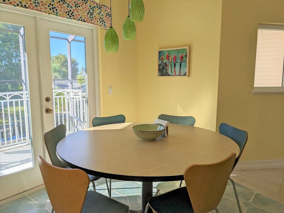 Dining area with view toward rear veranda.