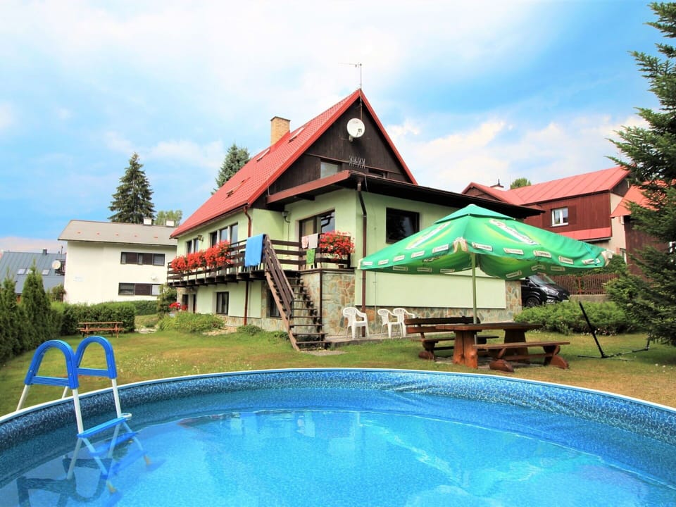 Cloud, Sky, Water, Plant, Building, Property, Swimming Pool, Tree, House, Shade