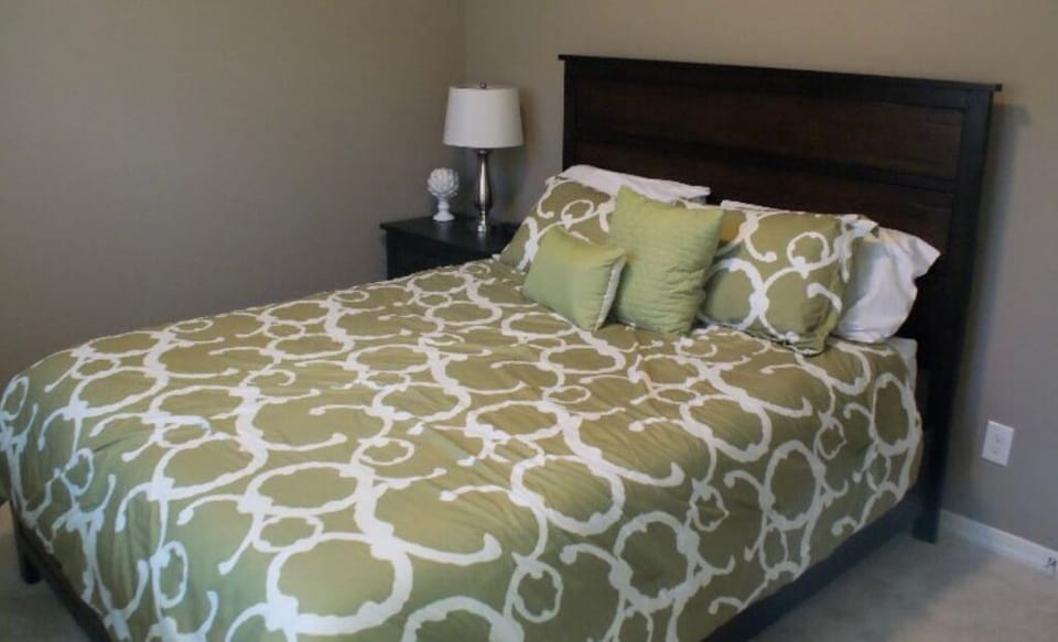 Green room with walk-in closet