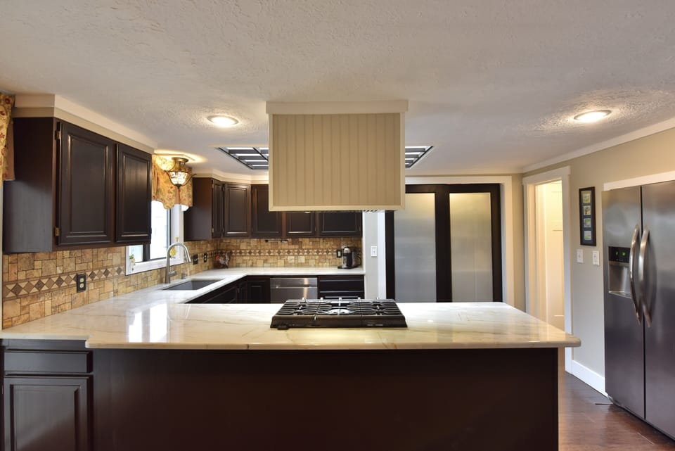 Kitchen. We provide all essentials for your cooking and dining needs.