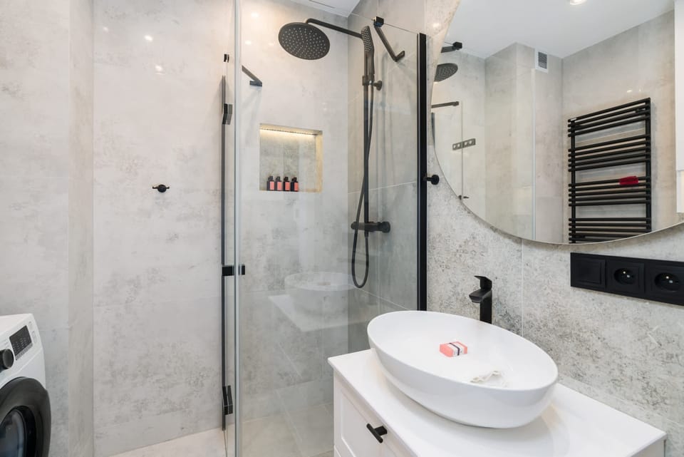 The bathroom offers a clean and functional space for your stay. 