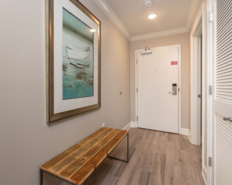 Step into a welcoming entryway with a stylish bench, perfect for beach gear after a day of fun