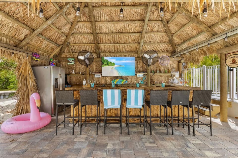 The tiki hut with built in entertainment and fridge