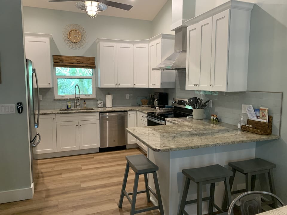 Kitchen and counter space with seating for 4.