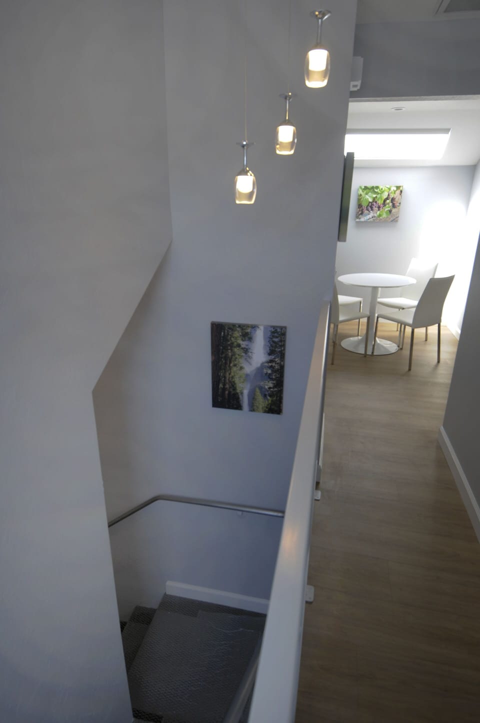 Photo of stairwell and hallway that take you up to the loft.