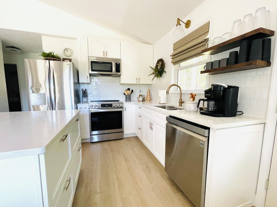 Stainless LG appliances including dishwasher, oven, microwave, refrigerator 