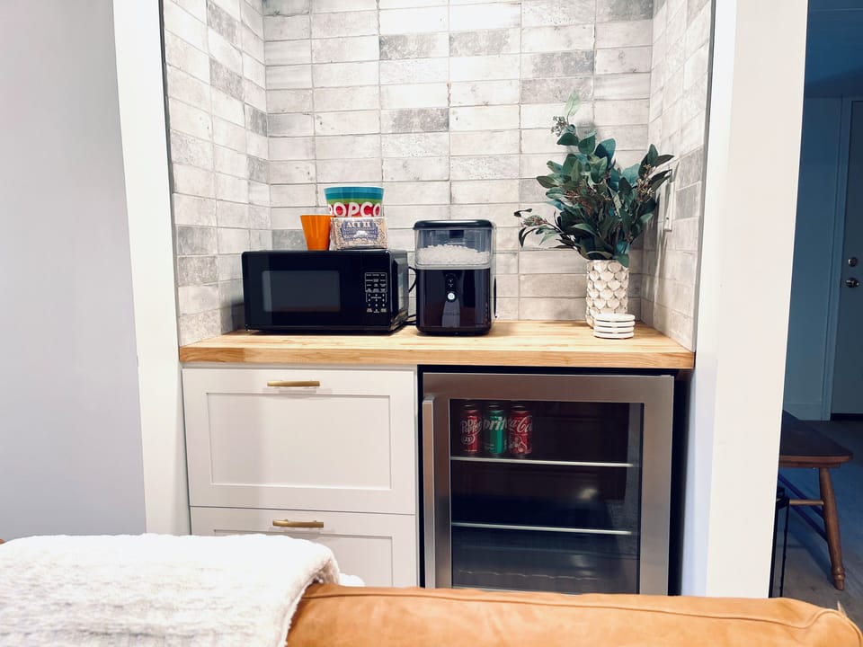 Snack niche in lower level tv/lounge area 