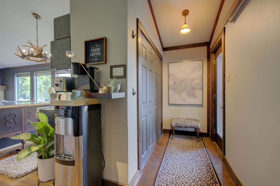 Private suite entrance, coffee bar, bottled, spring water.