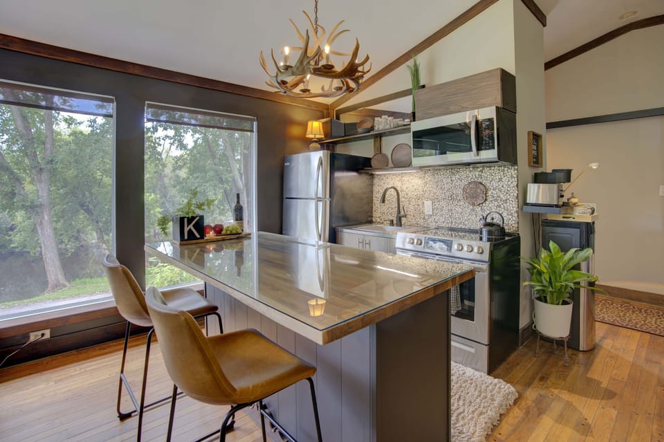 Full size fridge, stove, microwave with island/seating