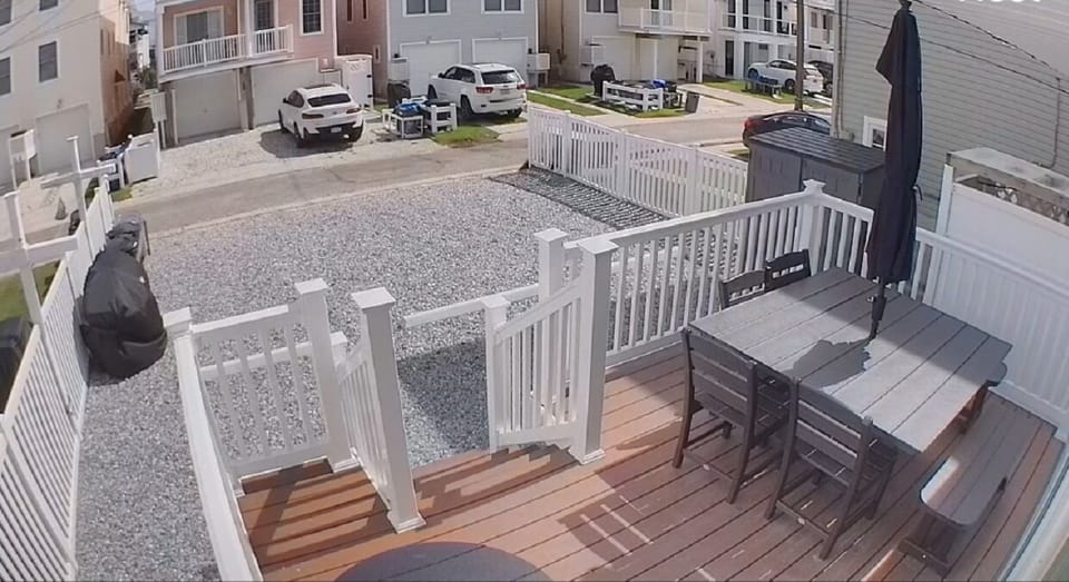 NEWER back patio deck with furniture for dining al fresco!