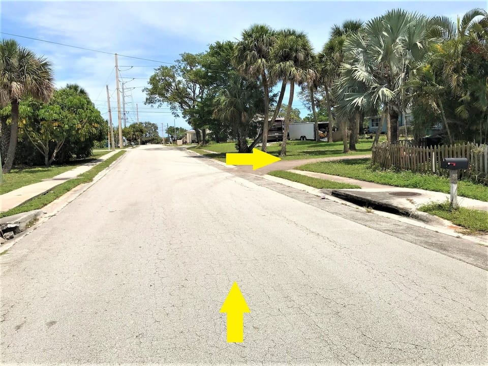 Turn right at gravel alleyway approximately 40 yards from the stop sign 