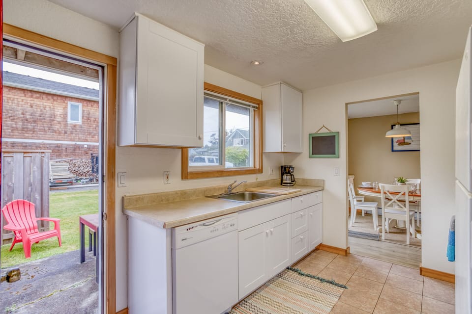Kitchen with Window view of Back Yard