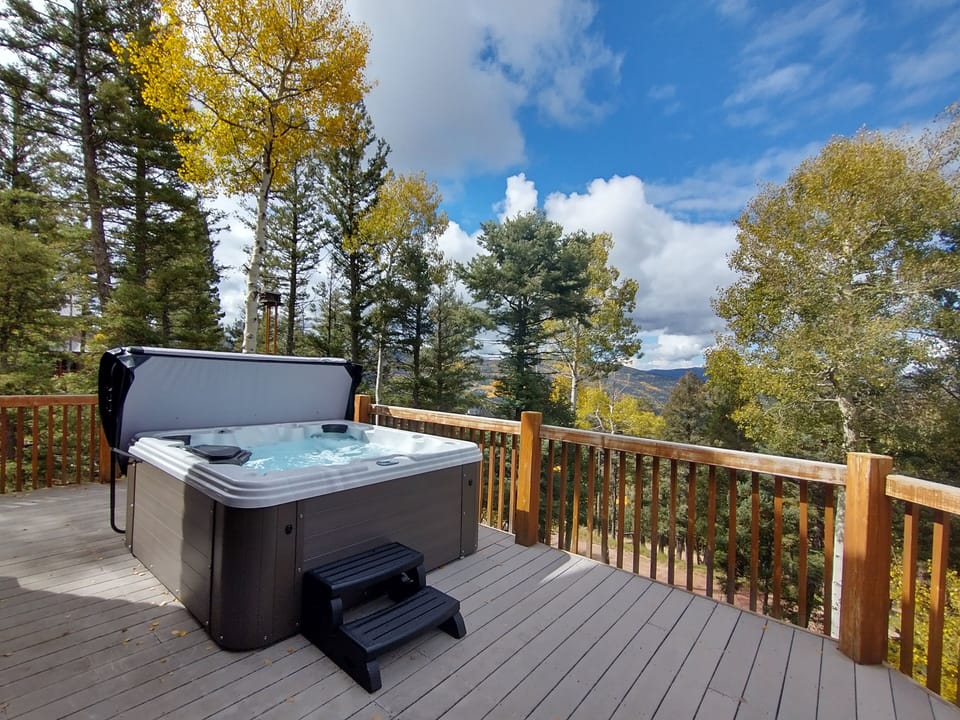 Hot tub sits on the deck right off the great room