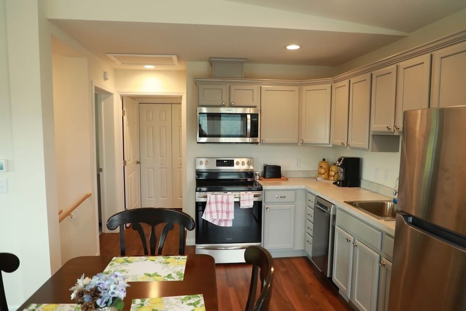 Full kitchen with ALL NEW appliances.  Dishwasher, stove, microwave, fridge.