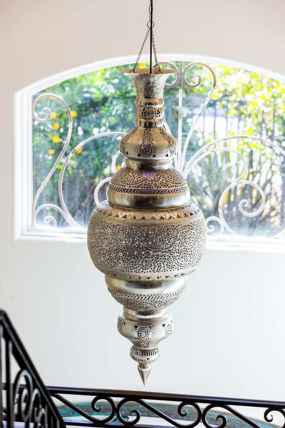 The Moroccan chandelier in the entry foyer...