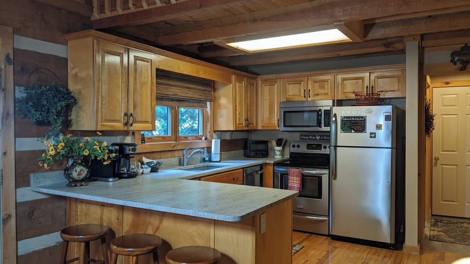 Open concept, fully stocked kitchen for all your cooking needs!