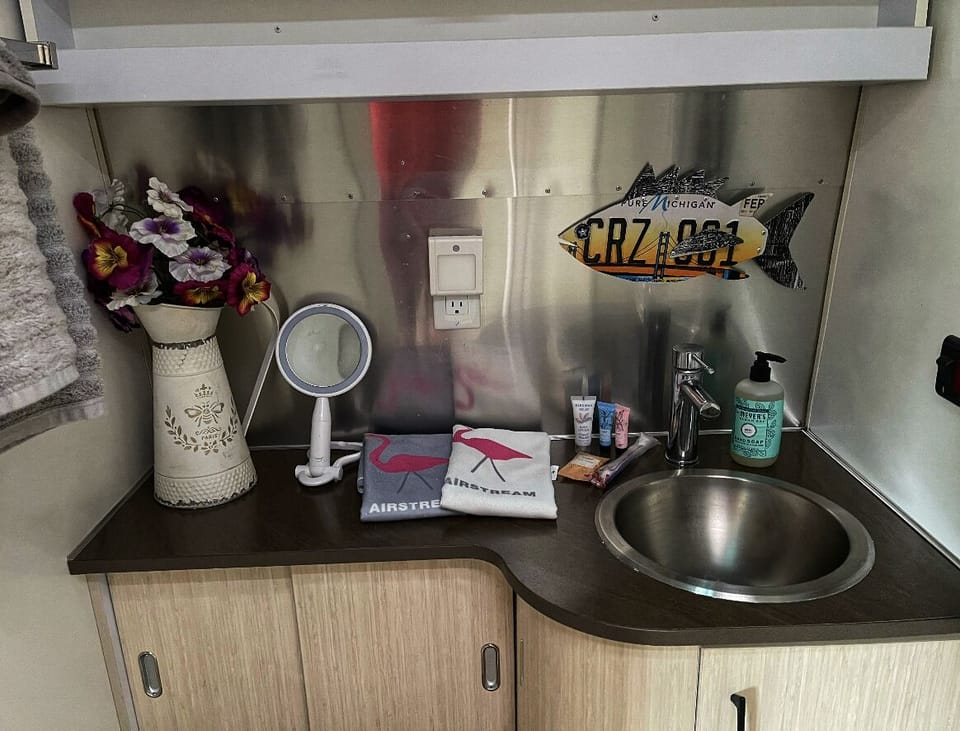 Bathroom with complimentary toiletries and fresh towels 