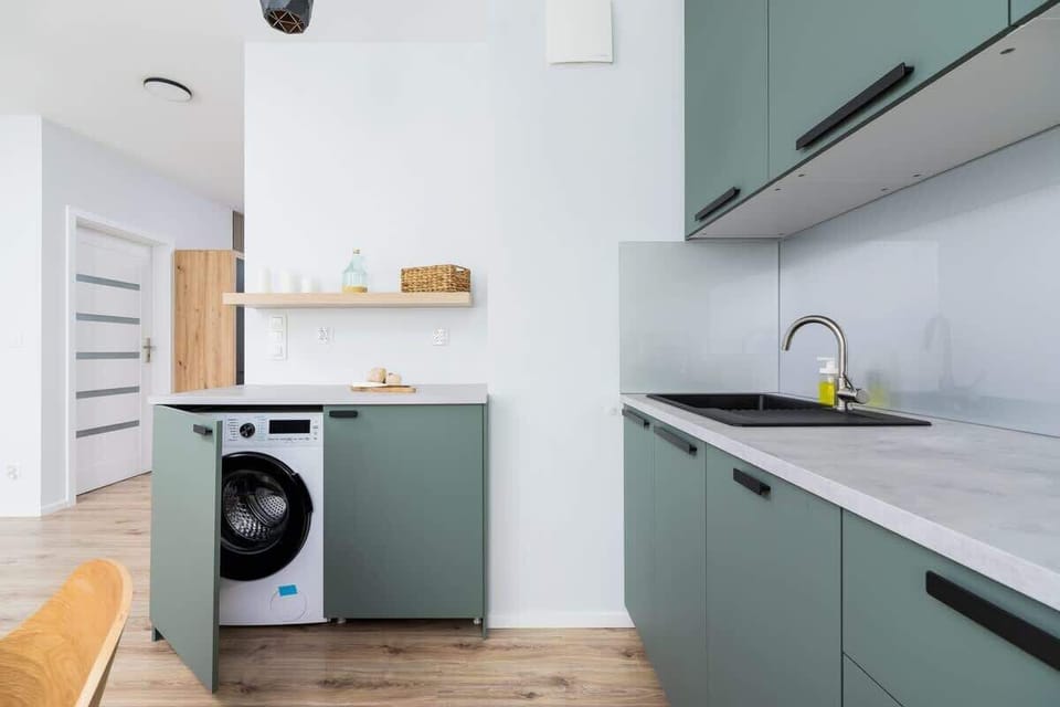 The fully equipped kitchenette includes everything you need for a home-cooked meal.