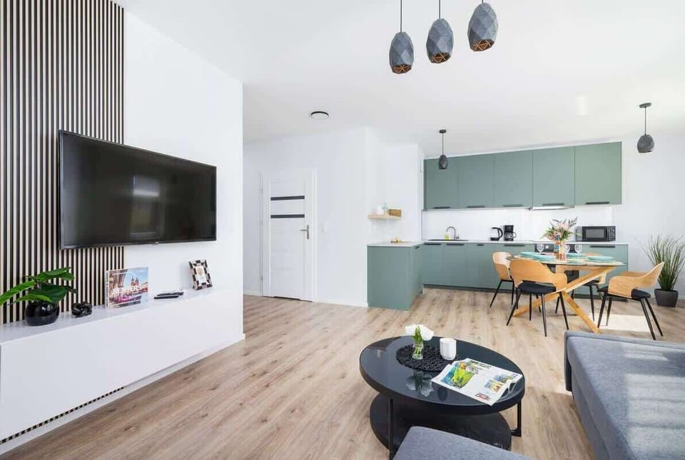 The living room offers a perfect blend of functionality and modern style. 