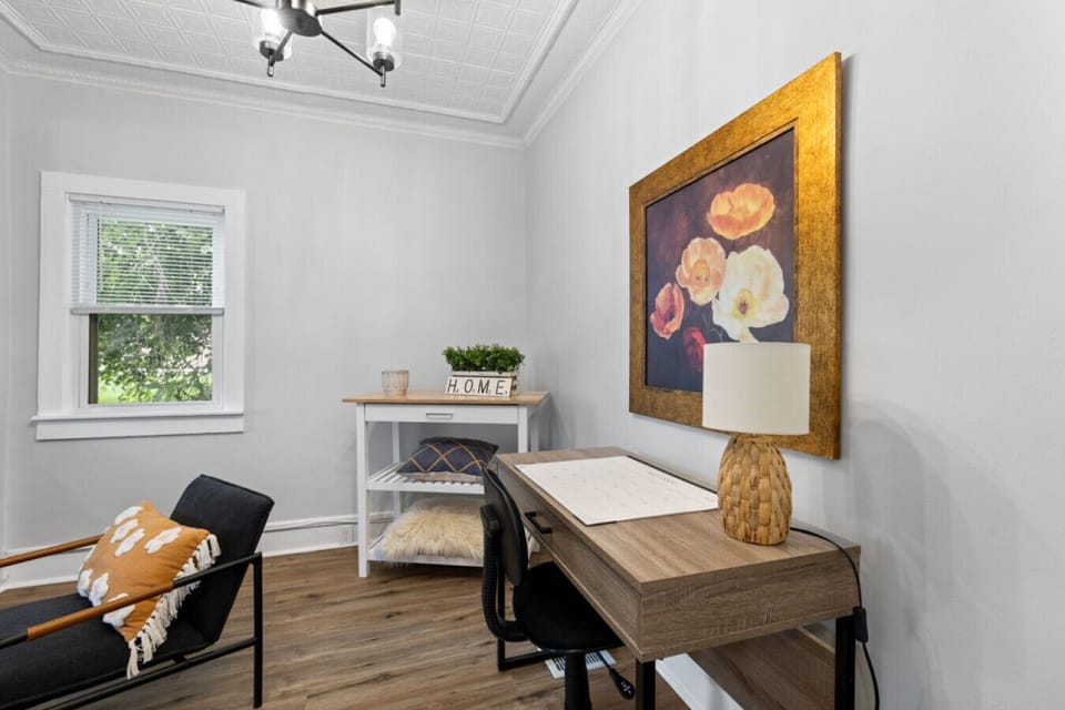 Dedicated workspace in living room with office desk chair