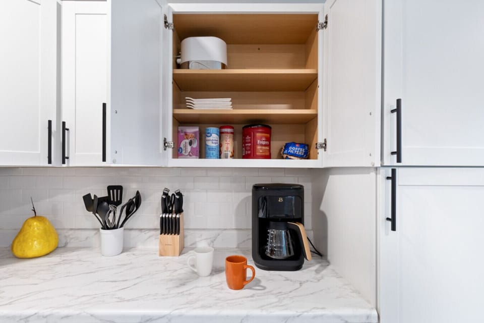 Brew pot coffee maker with basic coffee and tea supplies provided