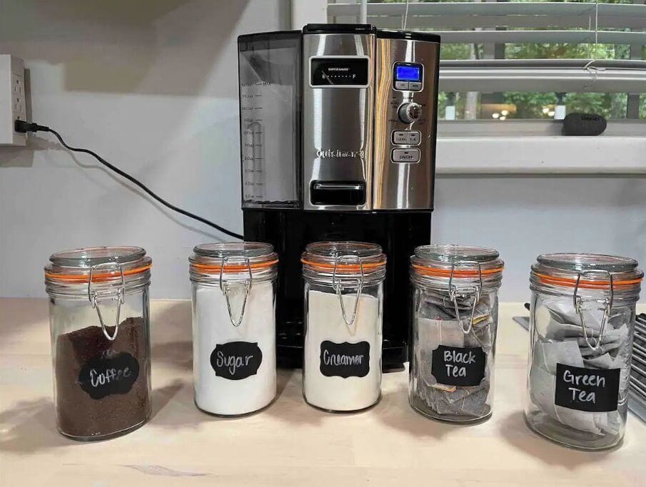 Large capacity coffee maker with complimentary coffee, powdered creamer, sugar