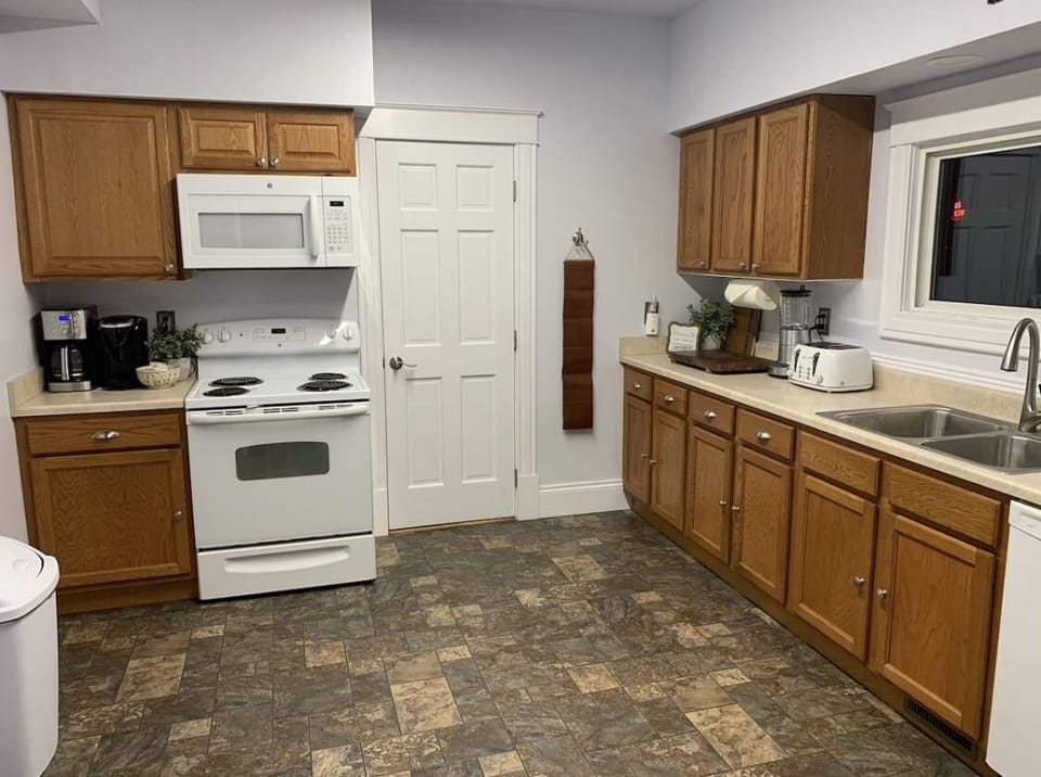 Large, fully stocked kitchen 