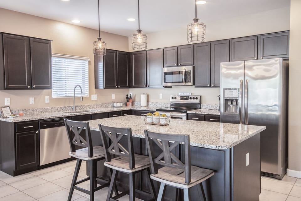 Large kitchen, SS appliances, fully stocked and granite countertops
