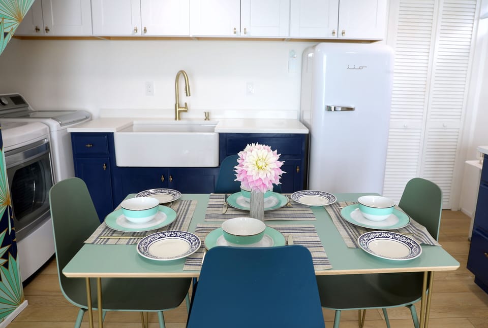 Dining area.  There is also a washer and dryer in the corner.