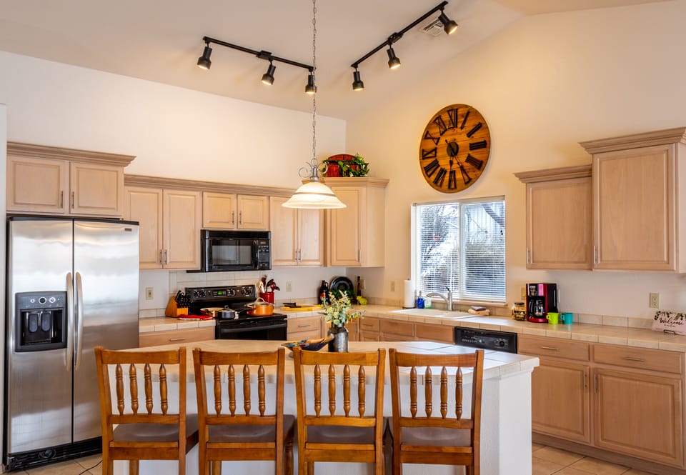 Fully stocked kitchen with island seating