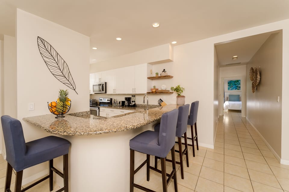 Well equipped Kitchen with Island Bar to entertain.
