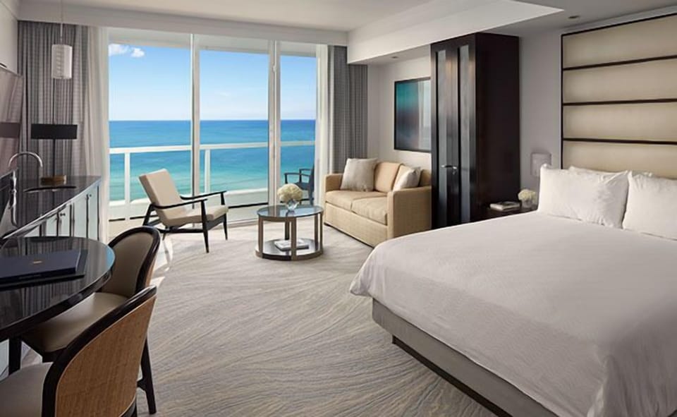 Wake up to ocean panoramas from your sunlit suite.