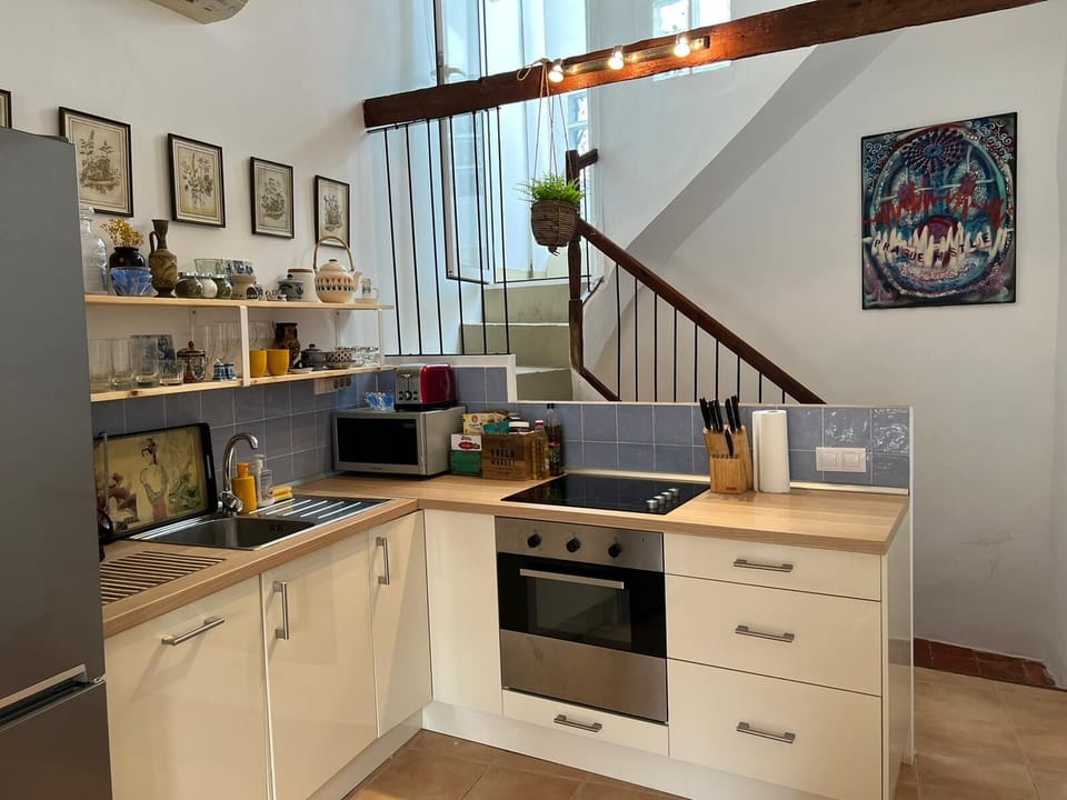 Kitchen with living room and TV
