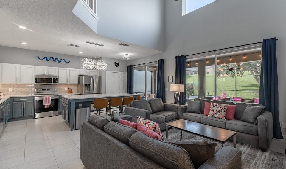 Open concept kitchen and living room with access to lanai.