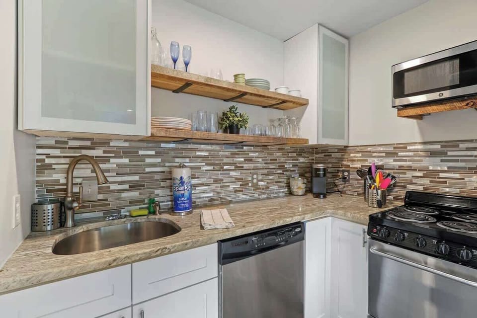 This charming kitchenette offers everything you need for a cozy culinary experience.