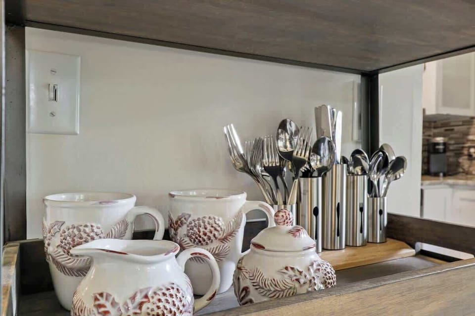 Discover convenience in this quaint kitchenette—your go-to spot for all culinary needs.