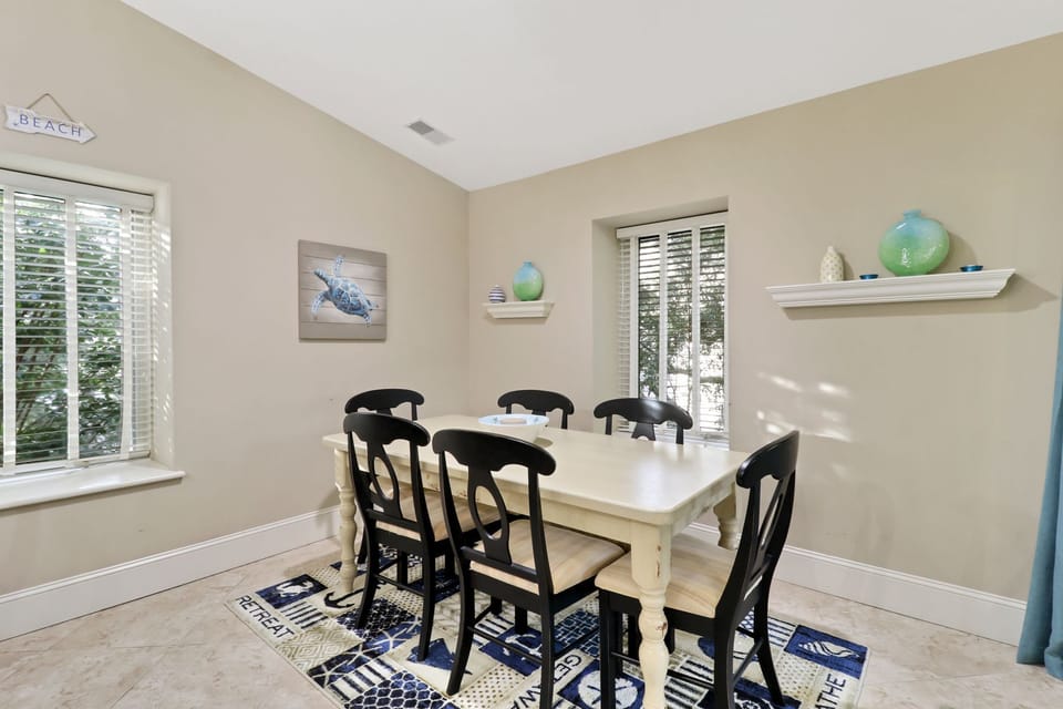 1692 Bluff Villas - Dining Area - Updated dining room furniture comfortably seats six.