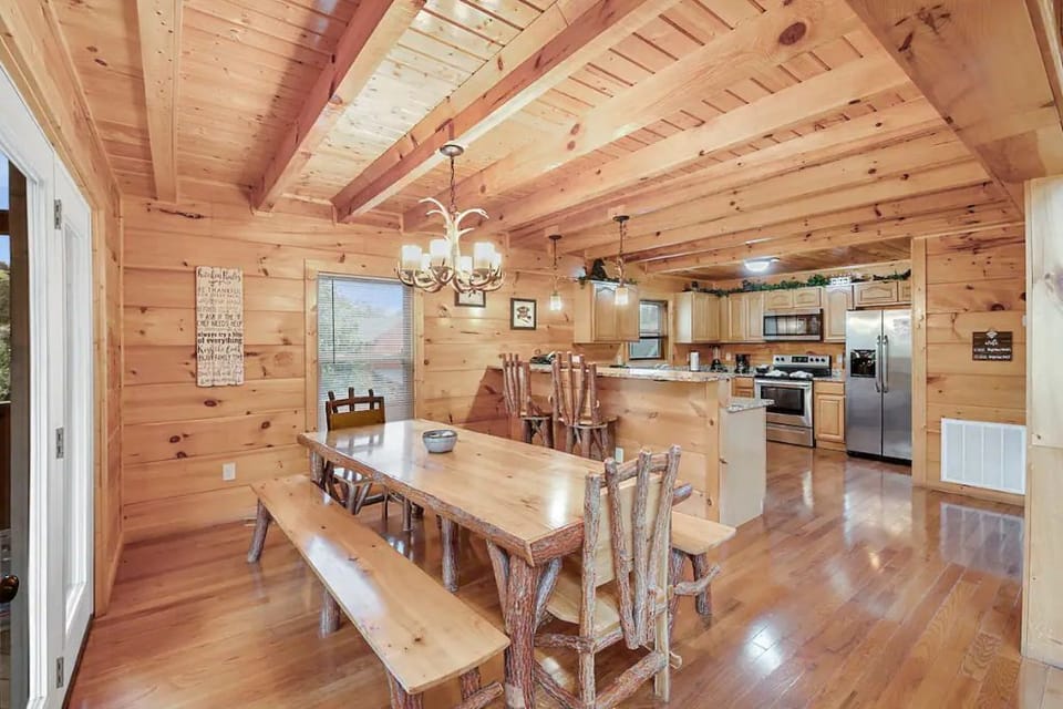 Dining/Kitchen area with doors leading to deck